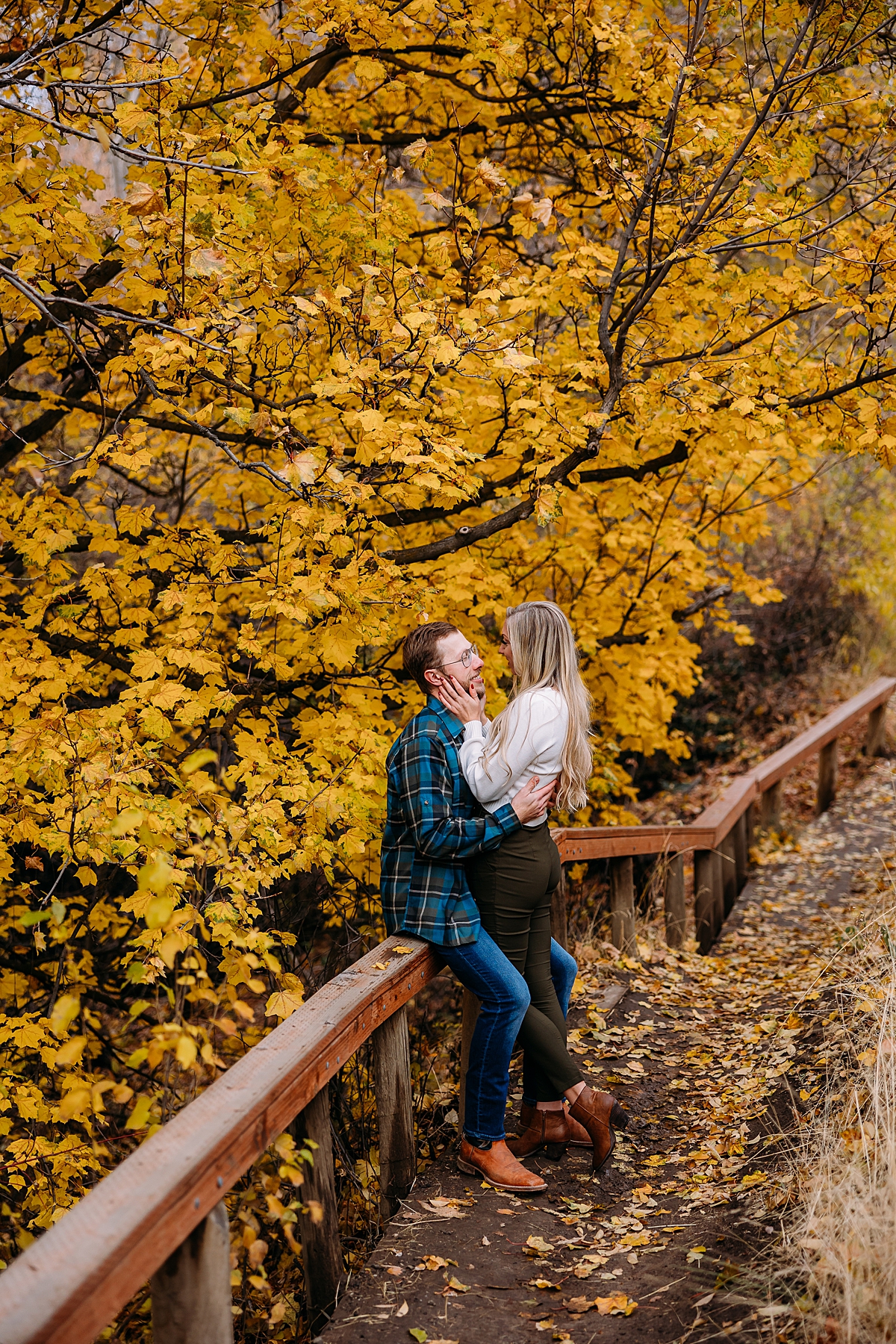 couple with fall leaves