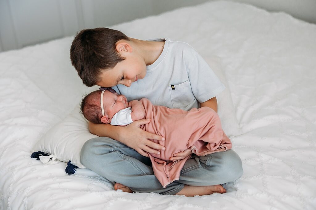 siblings at newborn session, relaxed newborn photo session